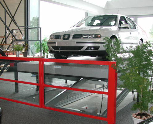 silver car on lift table